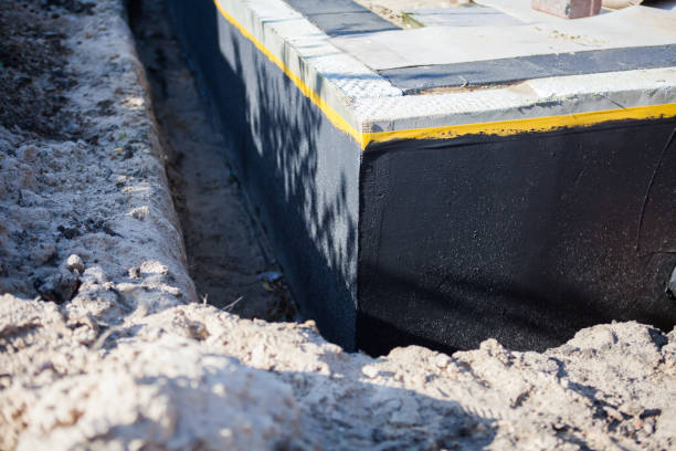Professional Wet Basement Repair technician working in Lakeside, OR